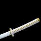 Vue latérale du manche du katana – tressage blanc avec intérieur or façon peau de raie synthétique