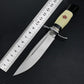Dimensions du couteau NKVD 95X18 comparées avec une règle – idéal pour survie et bushcraft
