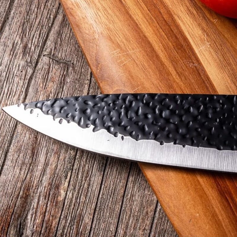 Couteau de cuisine japonais idéale pour une découpe précise et facile en cuisine. Lame en acier inoxydable de haute qualité bord super tranchant.
