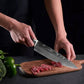 Couteau de chef japonais collection Kurogane émincer la viande